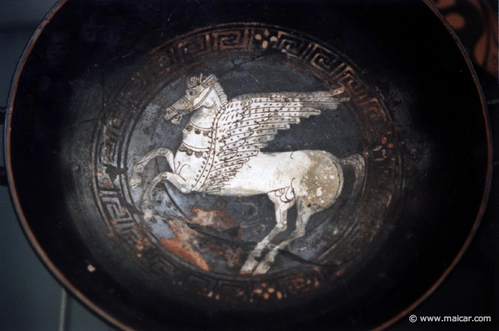 8223.jpg - 8223: Black cup (kylix) with added colour showing Pegasus in the tondo and youths on the exterior. Faliscan c. 350 BC. British Museum, London.