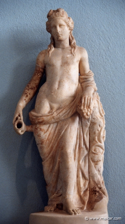 6436.jpg - 6436: Statuette of Dionysos holding a kantharos in his right hand. Roman period. Archaeological Museum of Eleusis.