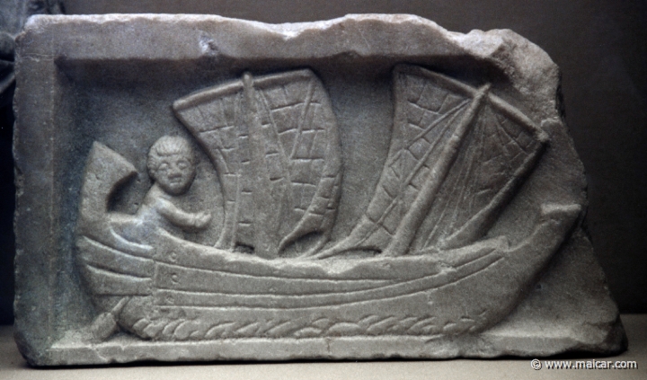 8317.jpg - 8317: Marble. Man sailing a corbita (a small coastal vessel) with two masts. Africa, Carthage c. AD 200. British Museum, London.
