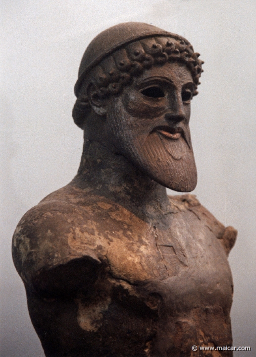 6137.jpg - 6137: Bronze statuette of Poseidon. Found in the sea in the Gulf of Livadostra in Boeotia, at the site of Kreusis, the port of Plataiai. About 480 BC. National Archaeological Museum, Athens.