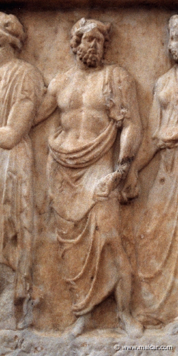 6309detail.jpg - 6309: Double votive relief (detail). Side B: To the left probably Artemis escorted by a god. In the middle the horned river god Kephissos. To the right 3 nymphs. About 410 BC. National Archaeological Museum, Athens.