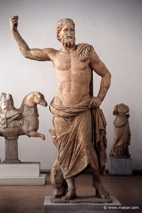 6215.jpg - 6215: Marble statue of Poseidon. In his raised right hand he was holding the trident. Found at Melos. Last quarter of the 2C BC. National Archaeological Museum, Athens.