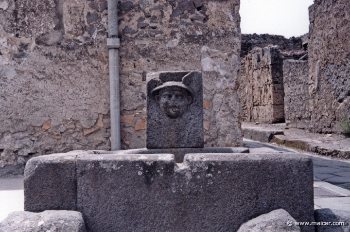 7407.jpg - Relief of Mercury in a fountain. Via di Mercurio, Pompeii.