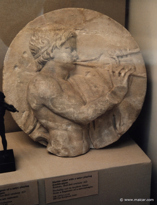 8316.jpg - 8316: Satyr playing double-pipes. Roman 1st-2nd century AD. British Museum, London.